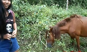 HD peeing next to horse approximately nett